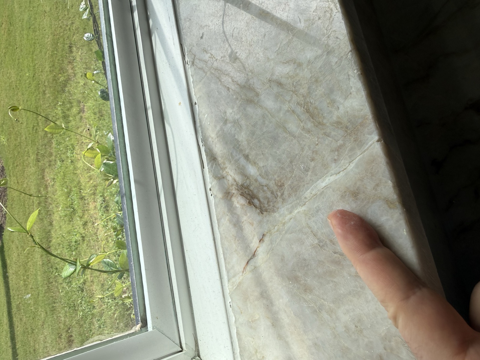 Cracks across a stone window sill